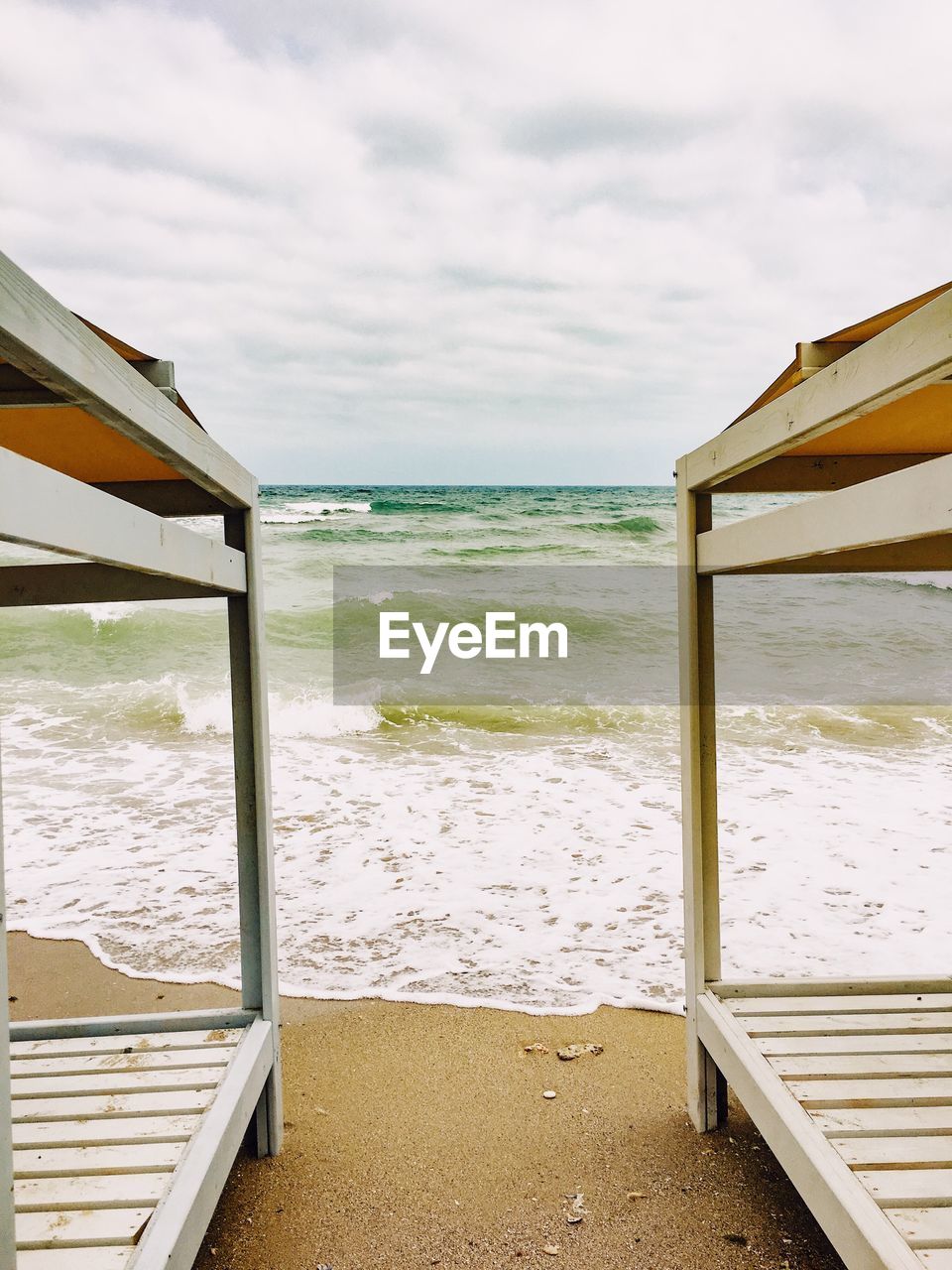 Scenic view of beach against sky