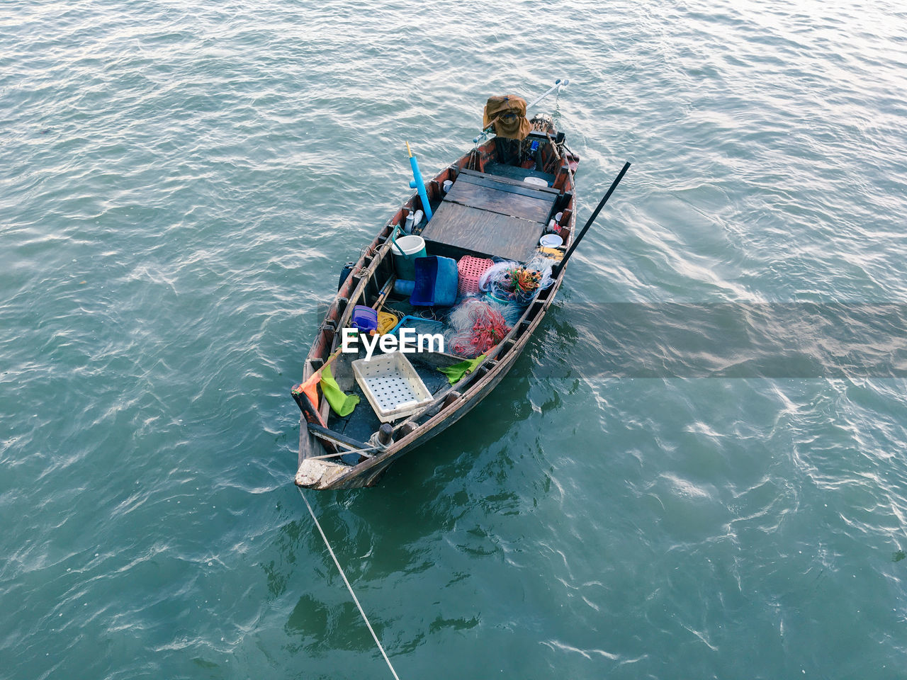 High angle view of fishing equipment in boat