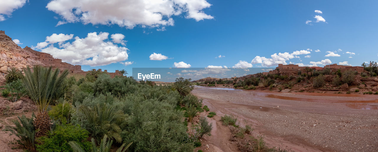 Panoramic view of road amidst desert against sky