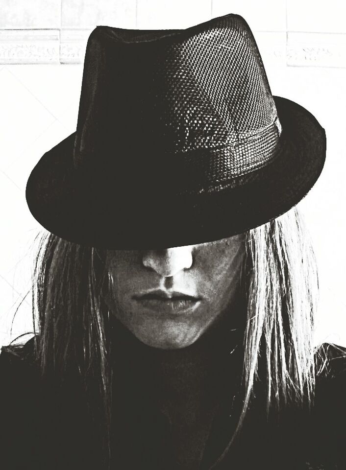 CLOSE-UP OF YOUNG WOMAN