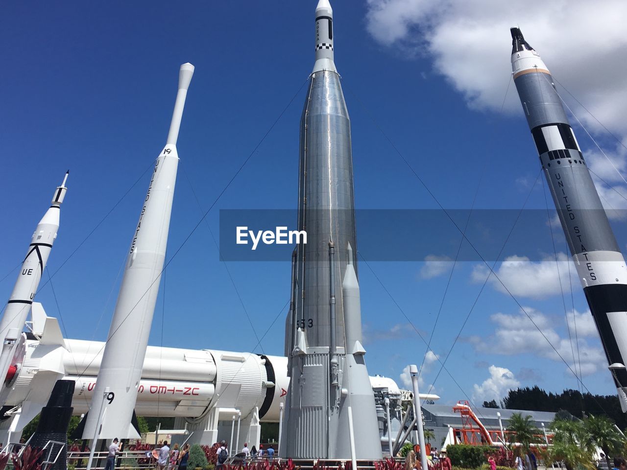 LOW ANGLE VIEW OF BUILT STRUCTURE AGAINST BLUE SKY