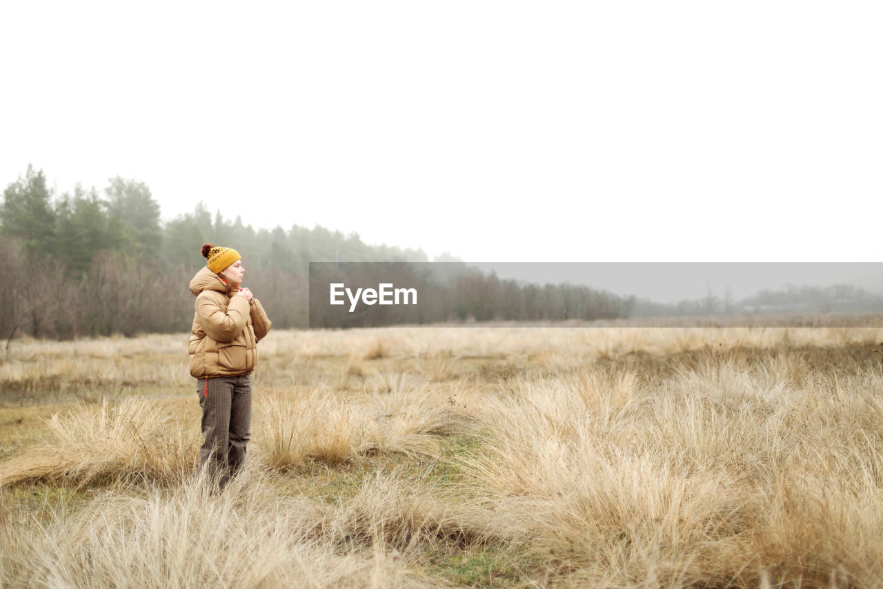 Outdoor portrait of a young woman.