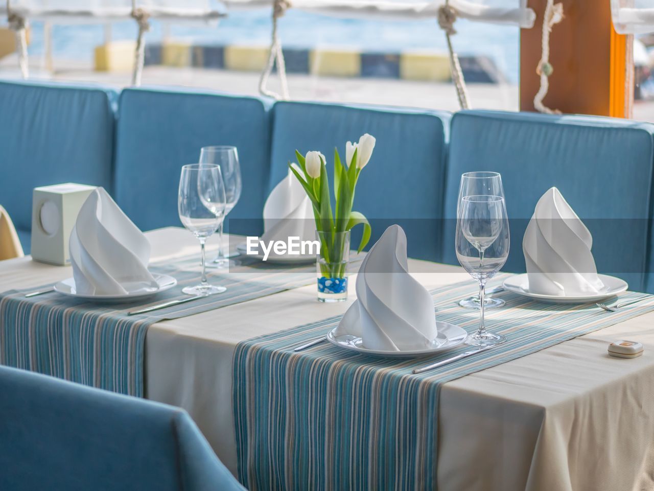 TABLE AND CHAIRS AT RESTAURANT