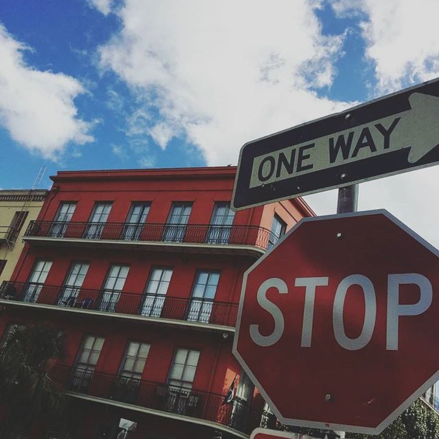 LOW ANGLE VIEW OF STOP SIGN