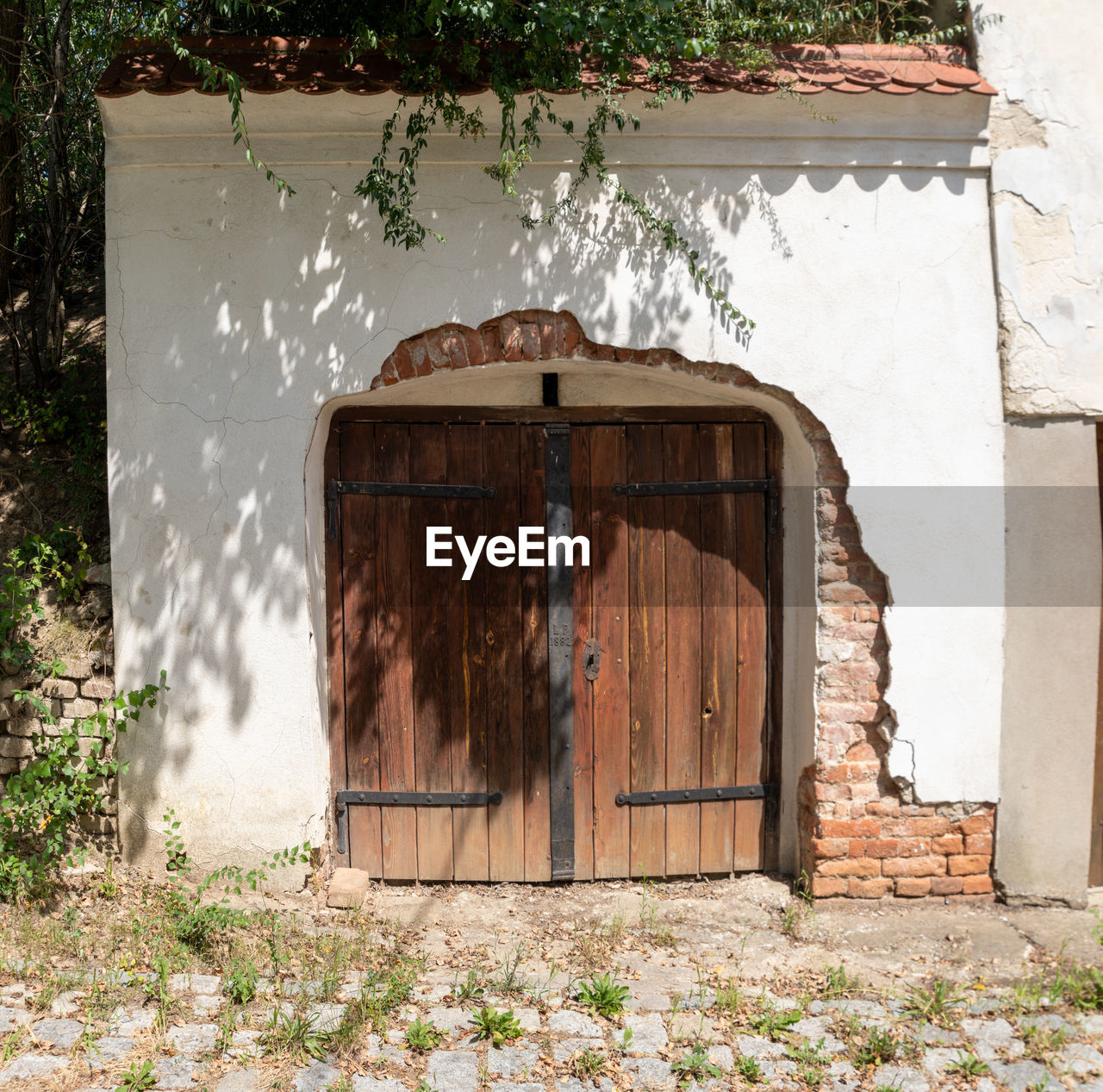 Closed door of abandoned house