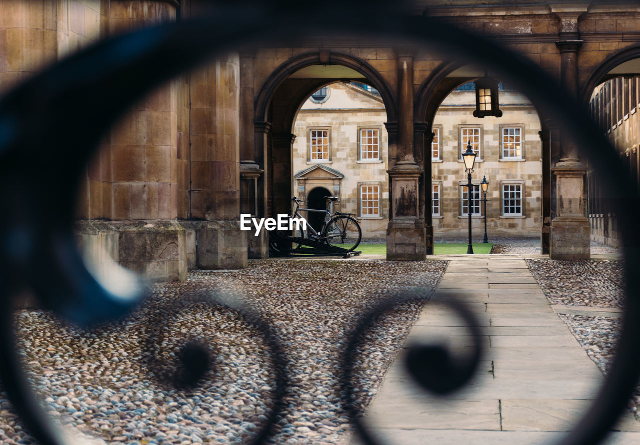 View of peterhouse cambridge through the college gate