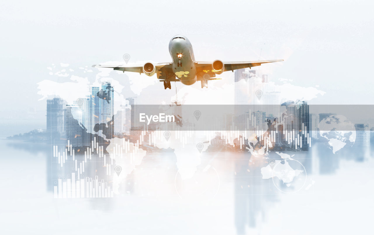 DIGITAL COMPOSITE IMAGE OF AIRPLANE IN CITY