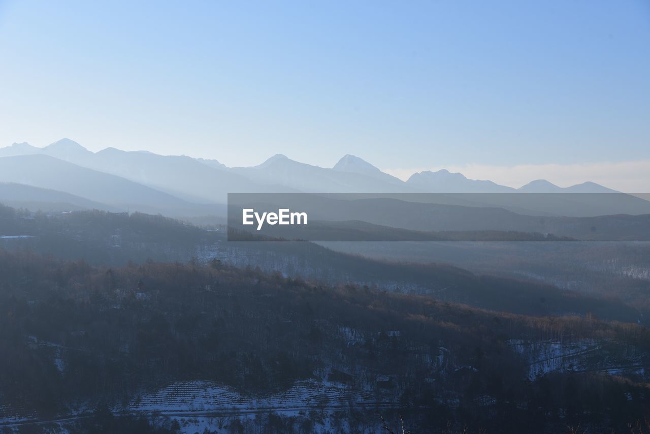 Scenic view of mountains against clear sky