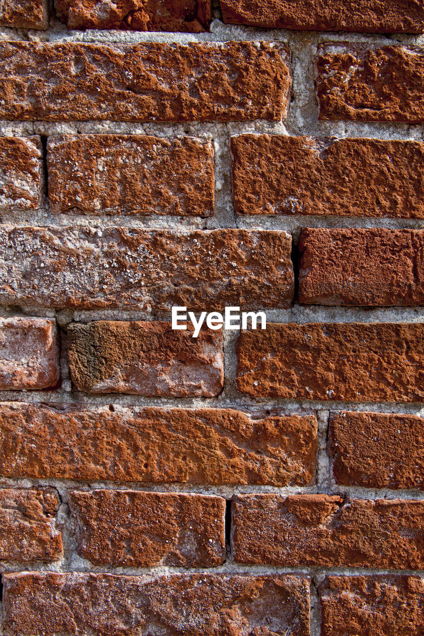 full frame shot of weathered brick wall