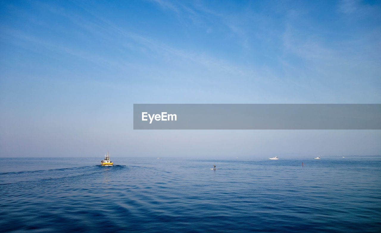 Boats sailing on sea