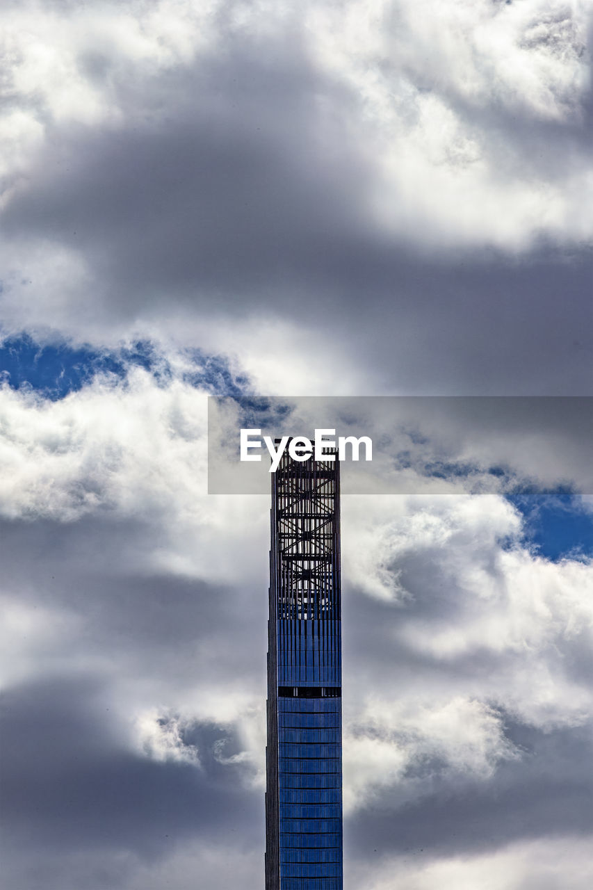 sky, cloud, blue, skyscraper, architecture, built structure, tower, building exterior, tower block, building, nature, horizon, city, no people, office building exterior, outdoors, cloudscape, day, office, business, low angle view, reflection, business finance and industry