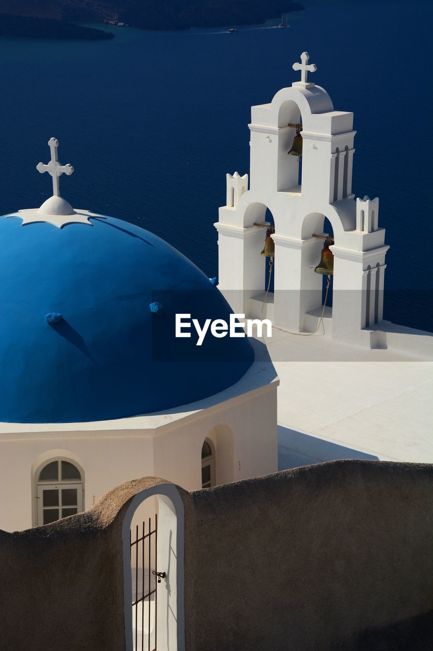 High angle view of church by sea at santorini