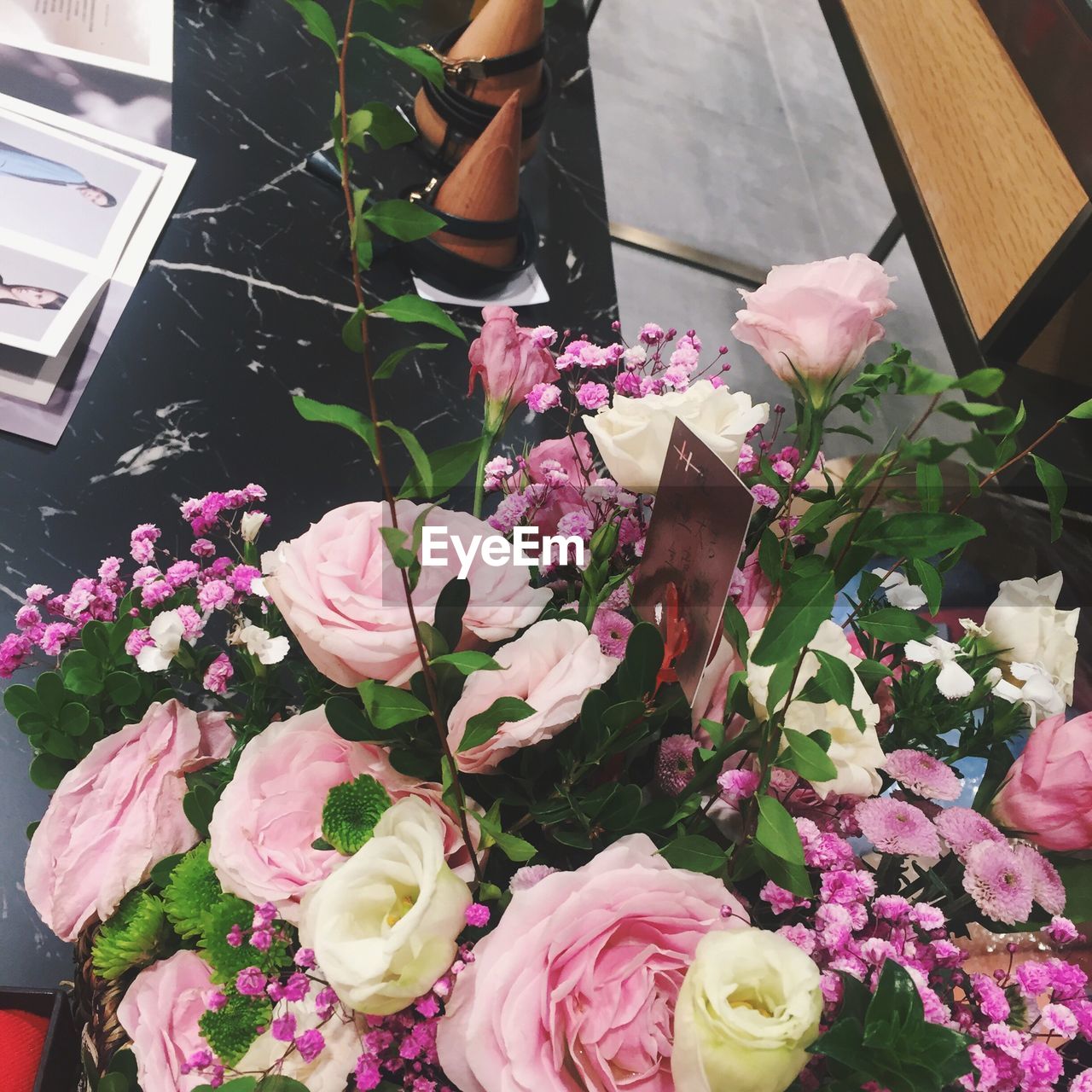 HIGH ANGLE VIEW OF PINK FLOWERS IN CONTAINER