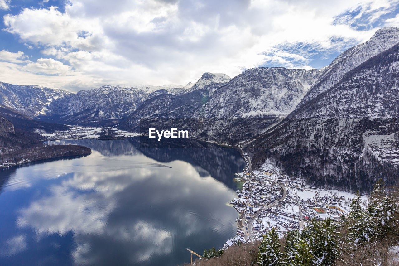 Aerial view of hallstatt town at lake and mountain ranges on a cold early spring day