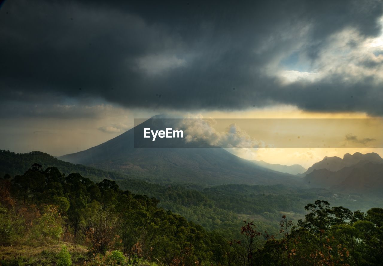 Scenic view of mountains against sky during sunset