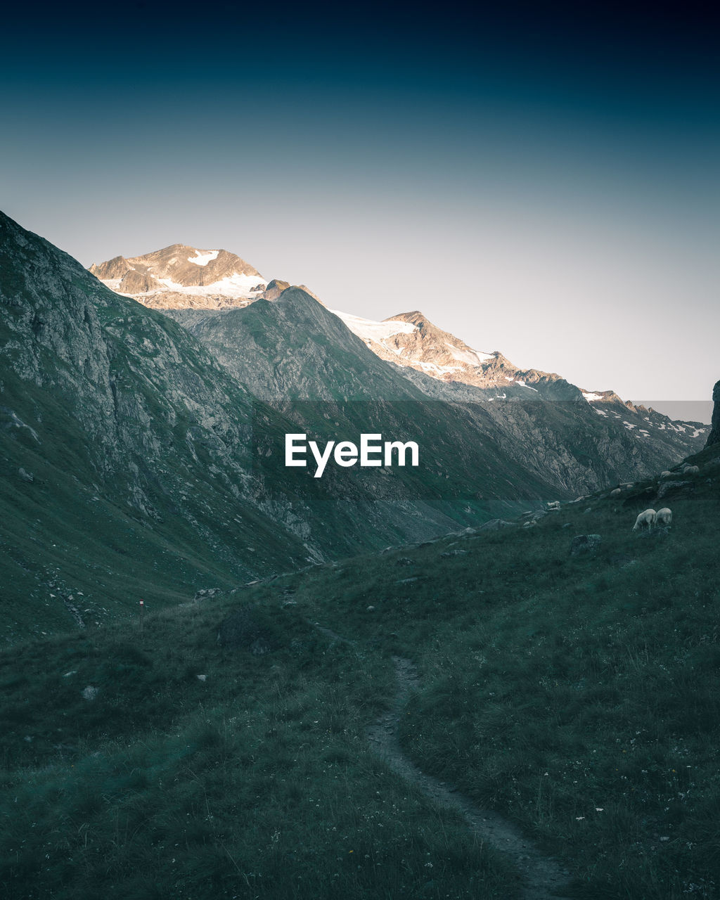 Scenic view of mountains against clear sky