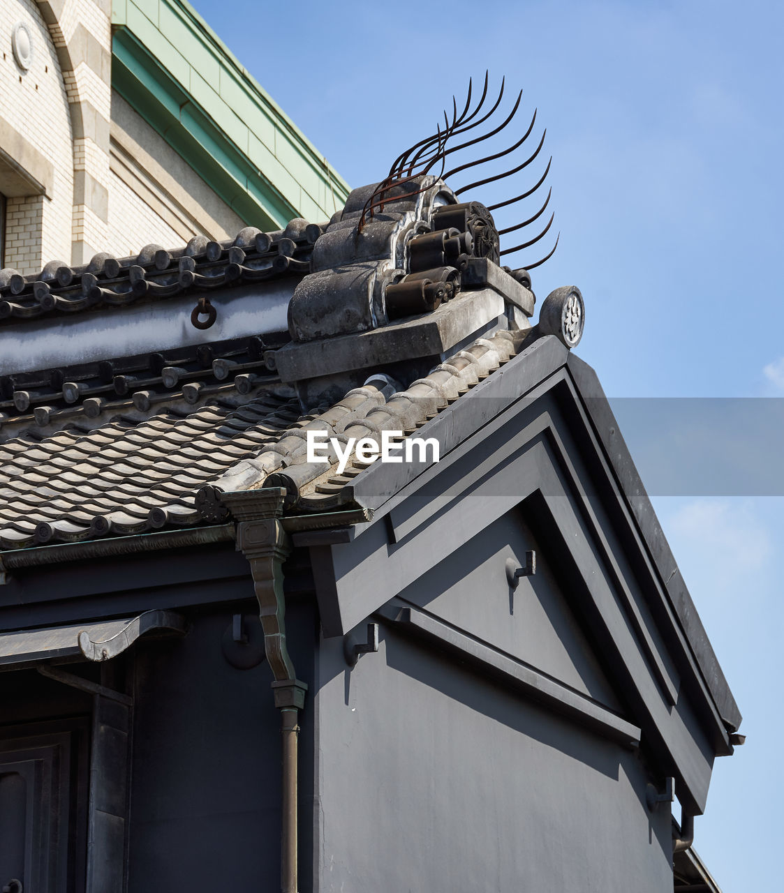 Low angle view of traditional japanese building against sky