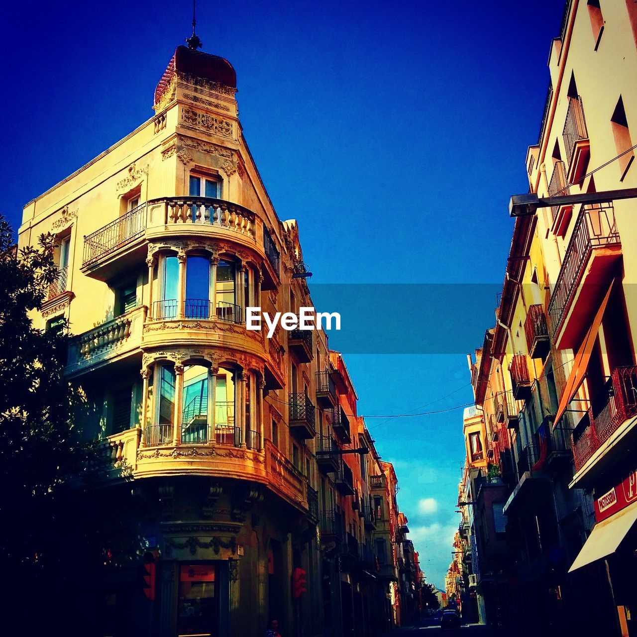 Low angle view of buildings in city against sky