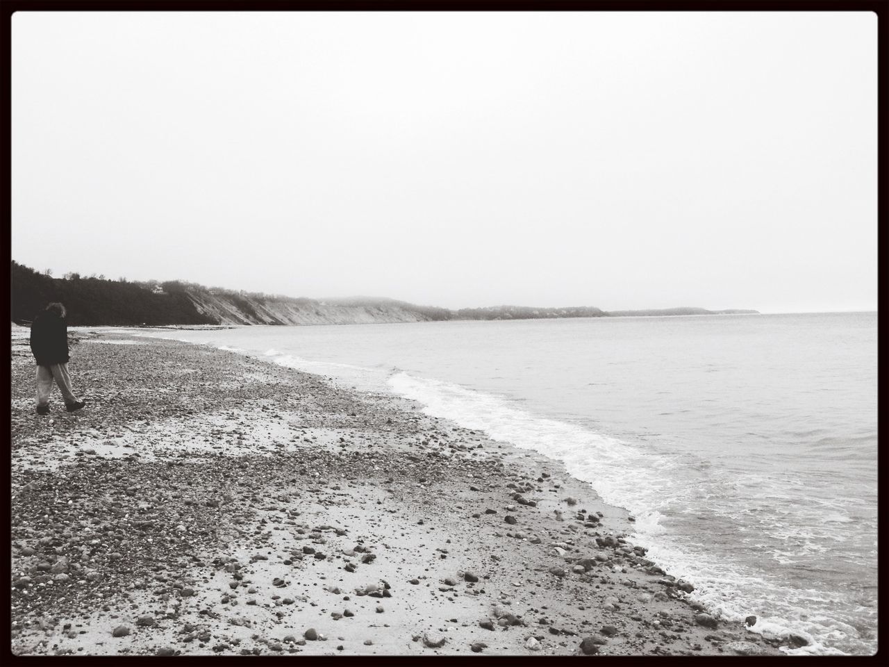 Scenic view of calm sea against clear sky