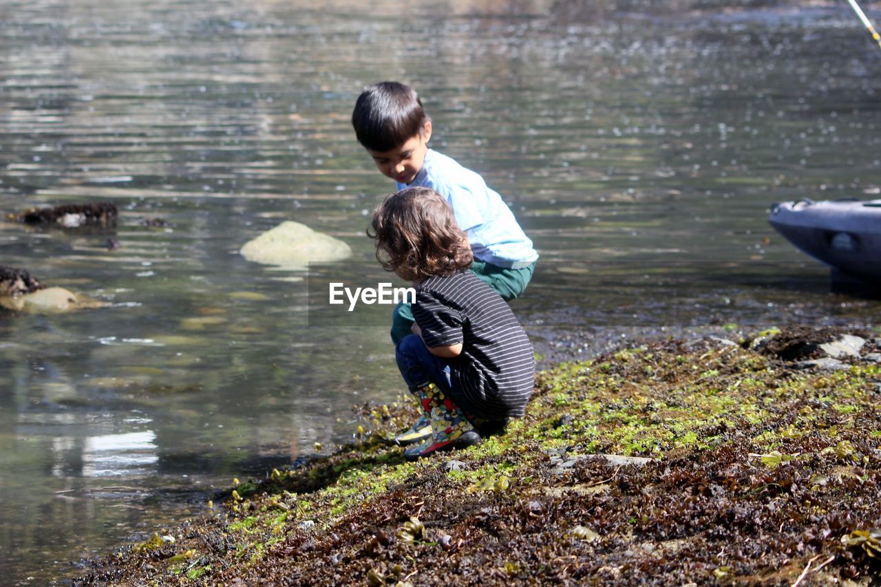 Siblings at lakeshore