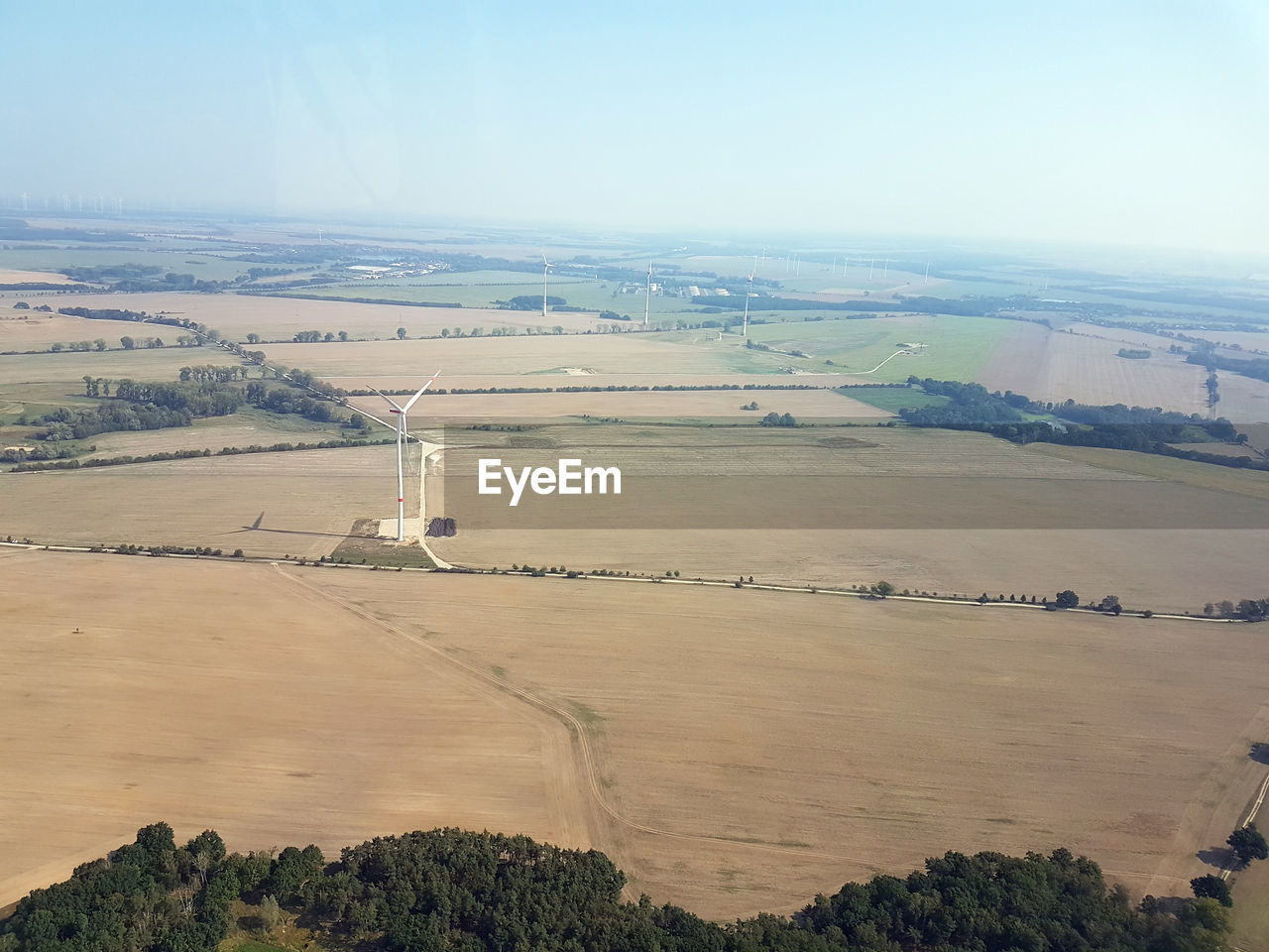 HIGH ANGLE VIEW OF FARM AGAINST SKY