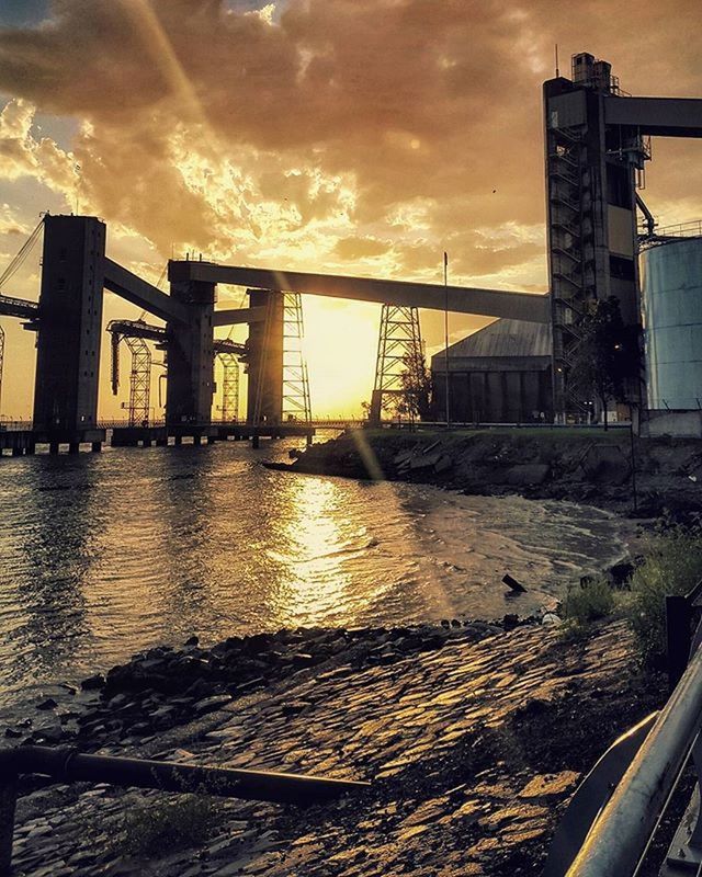 VIEW OF SUNSET OVER RIVER