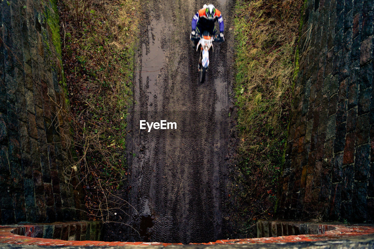 High angle view of motocross rider from bridge