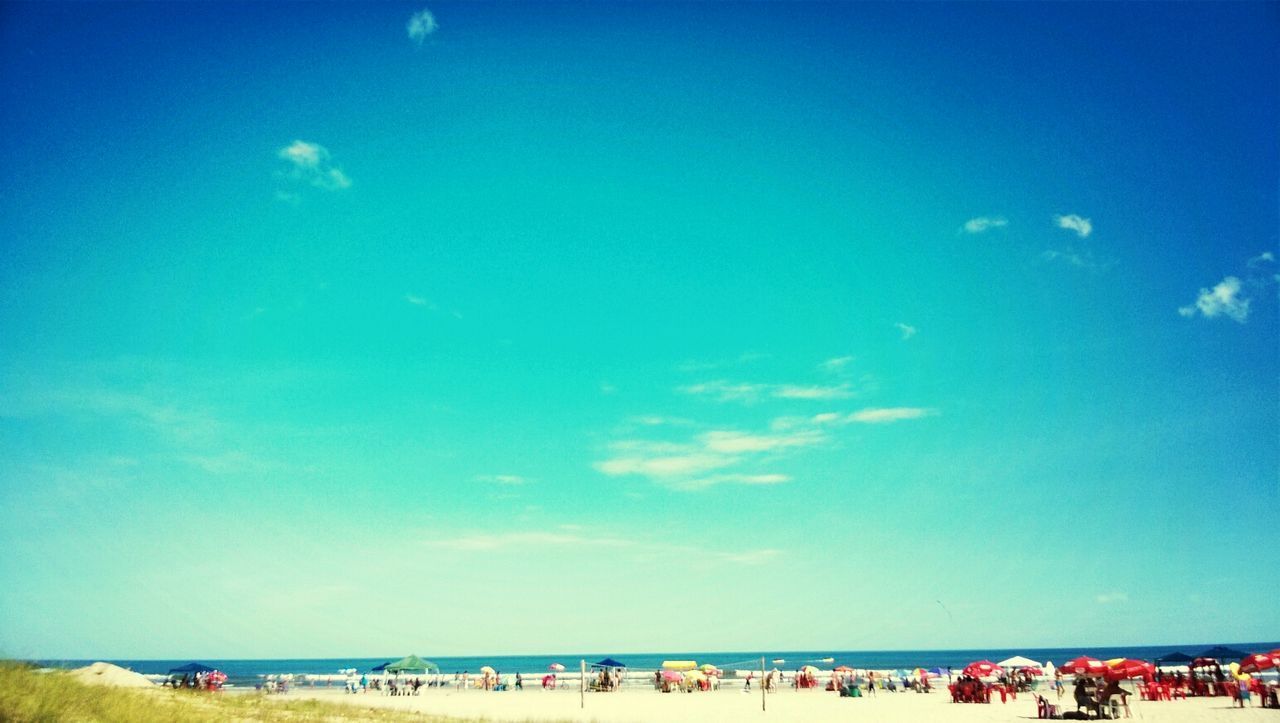 Beach against blue sky