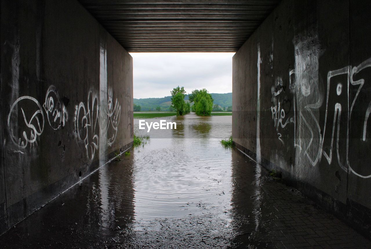 Tunnel leading towards river