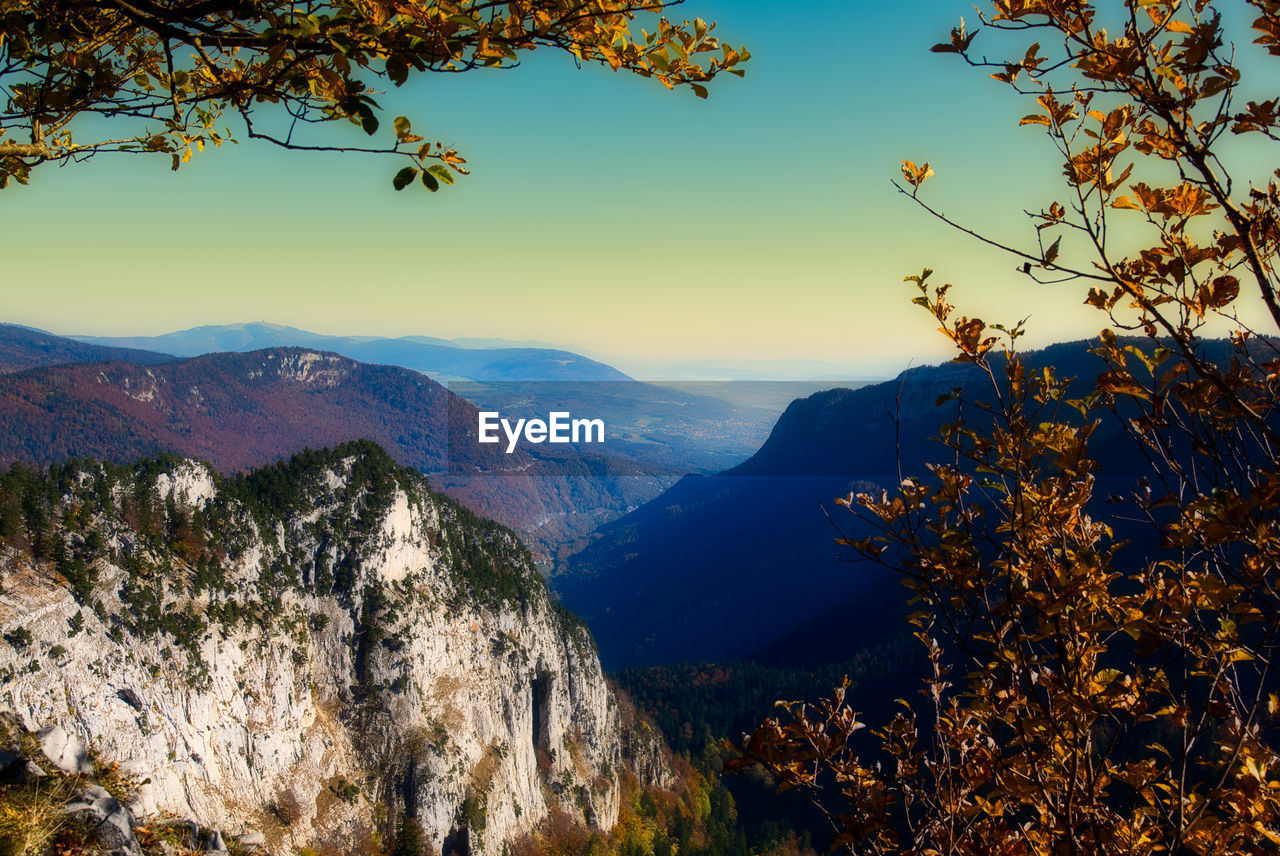 Scenic view of mountains against sky during sunset