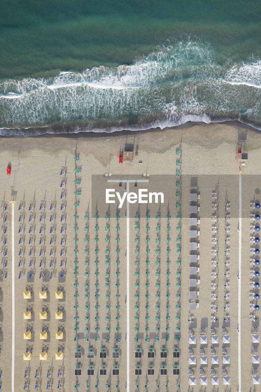 Aerial view of the beach of viareggio tuscany photographed in the early morning