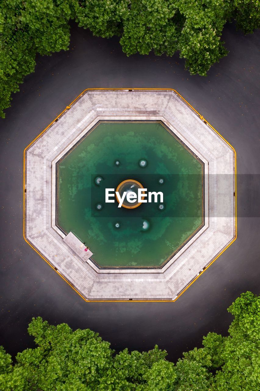 Aerial view of pond amidst trees