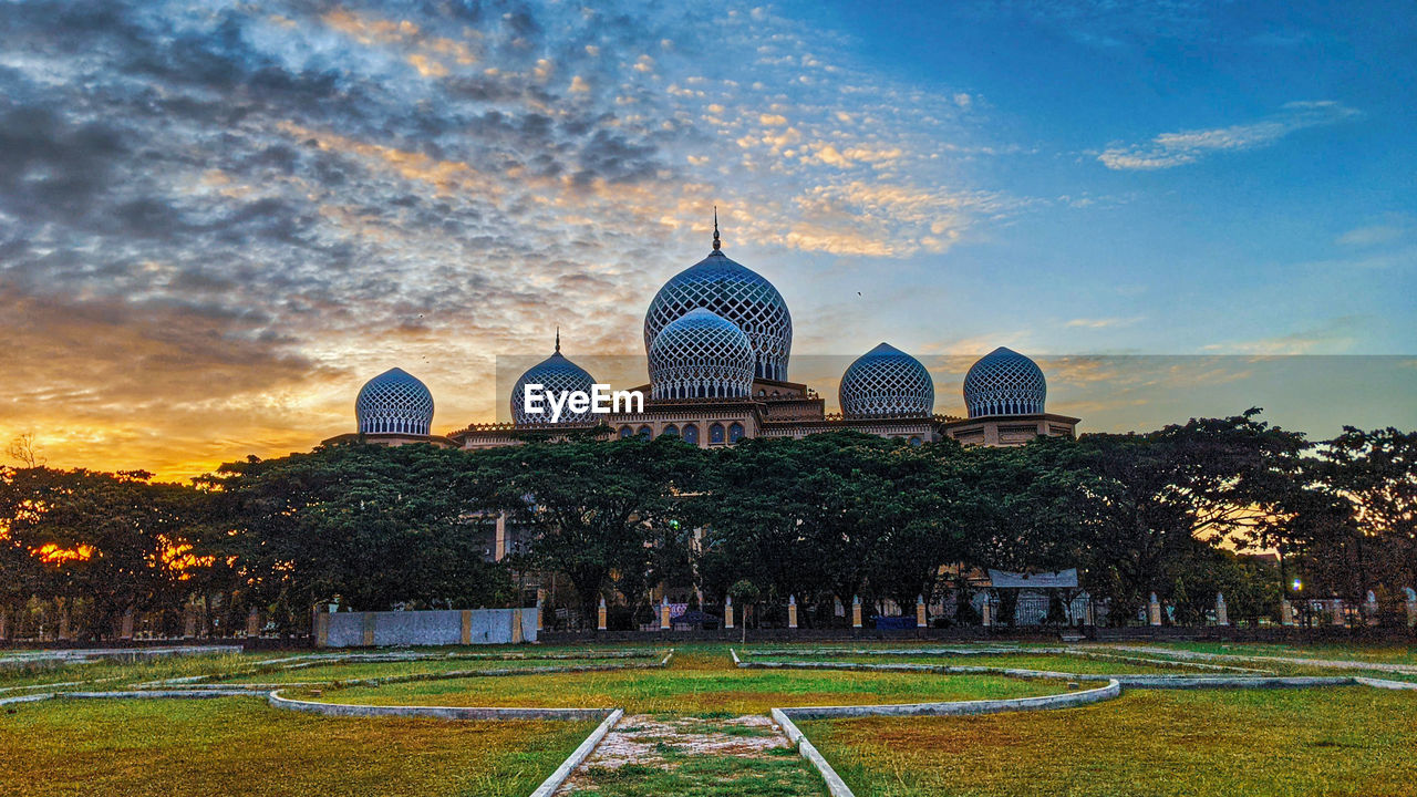 Building against sky during sunset
