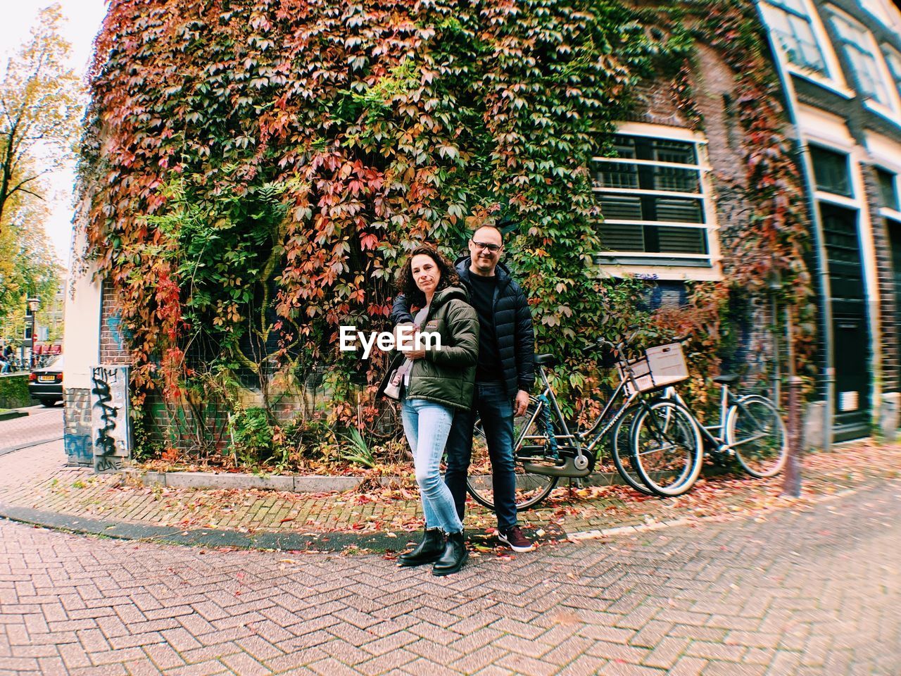 Full length of couple standing in city