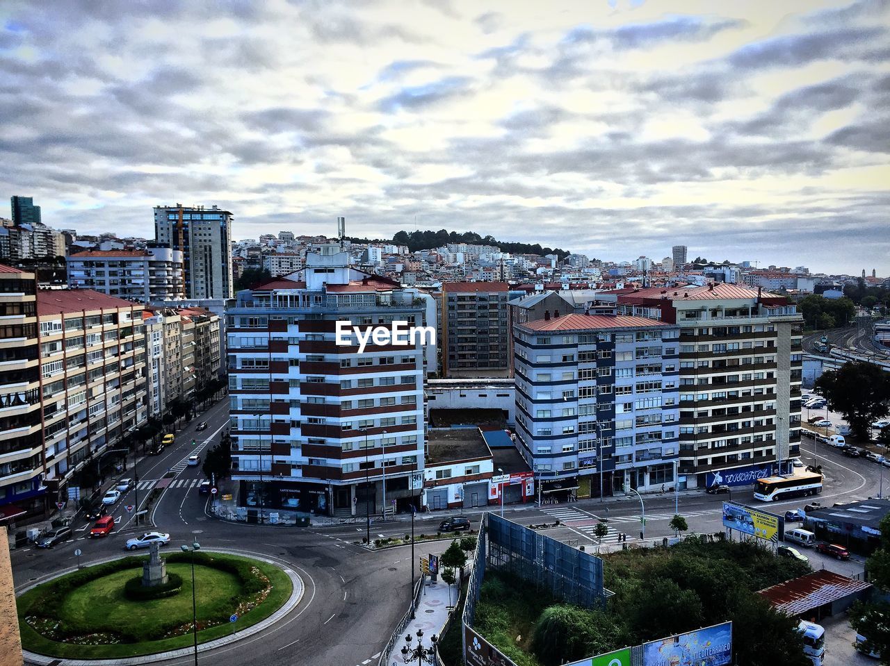 High angle view of buildings in city against sky