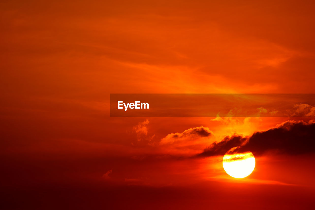 SCENIC VIEW OF DRAMATIC SKY DURING SUNSET