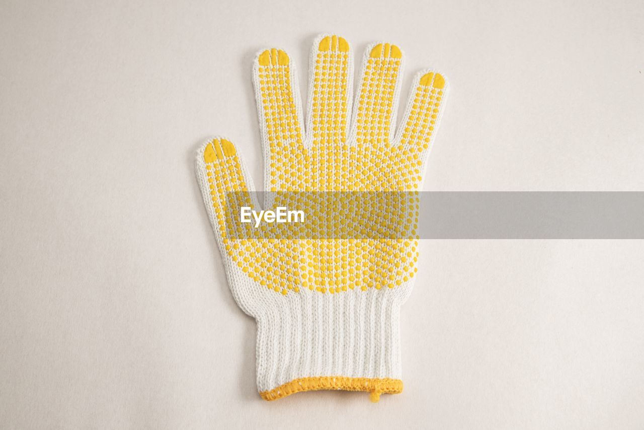 High angle view of glove against white background