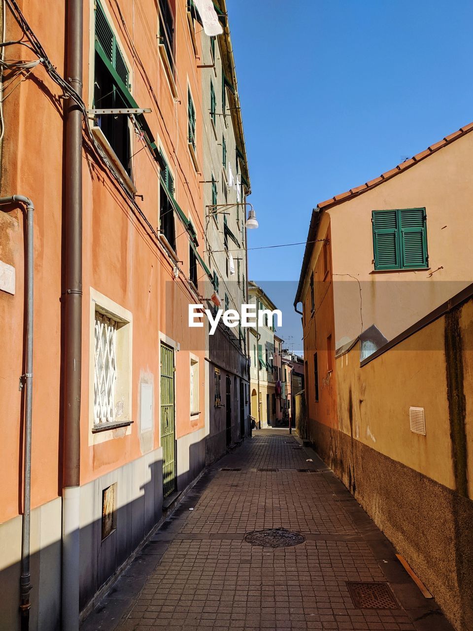 Narrow alley along buildings