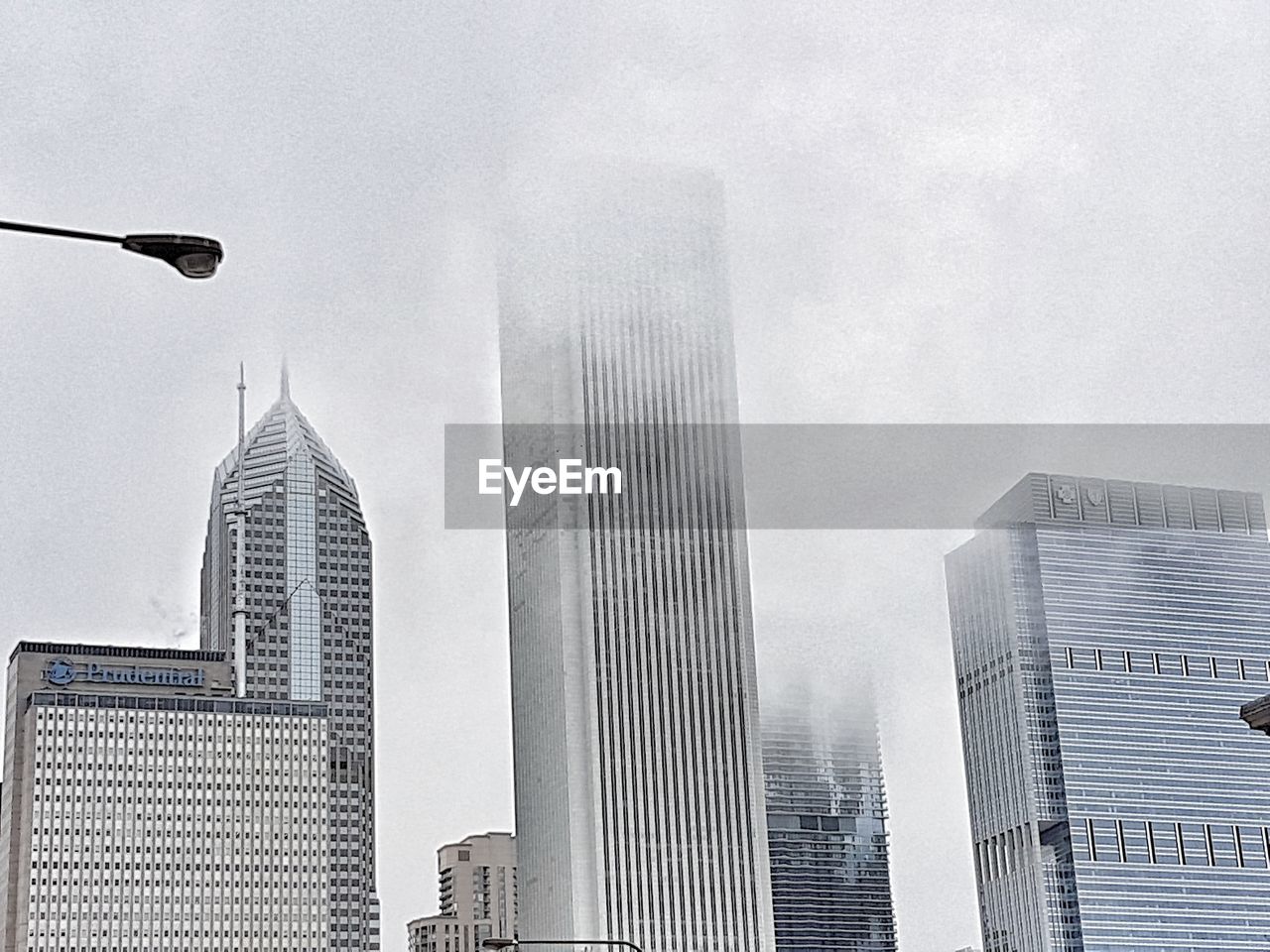 LOW ANGLE VIEW OF SKYSCRAPERS IN CITY AGAINST SKY