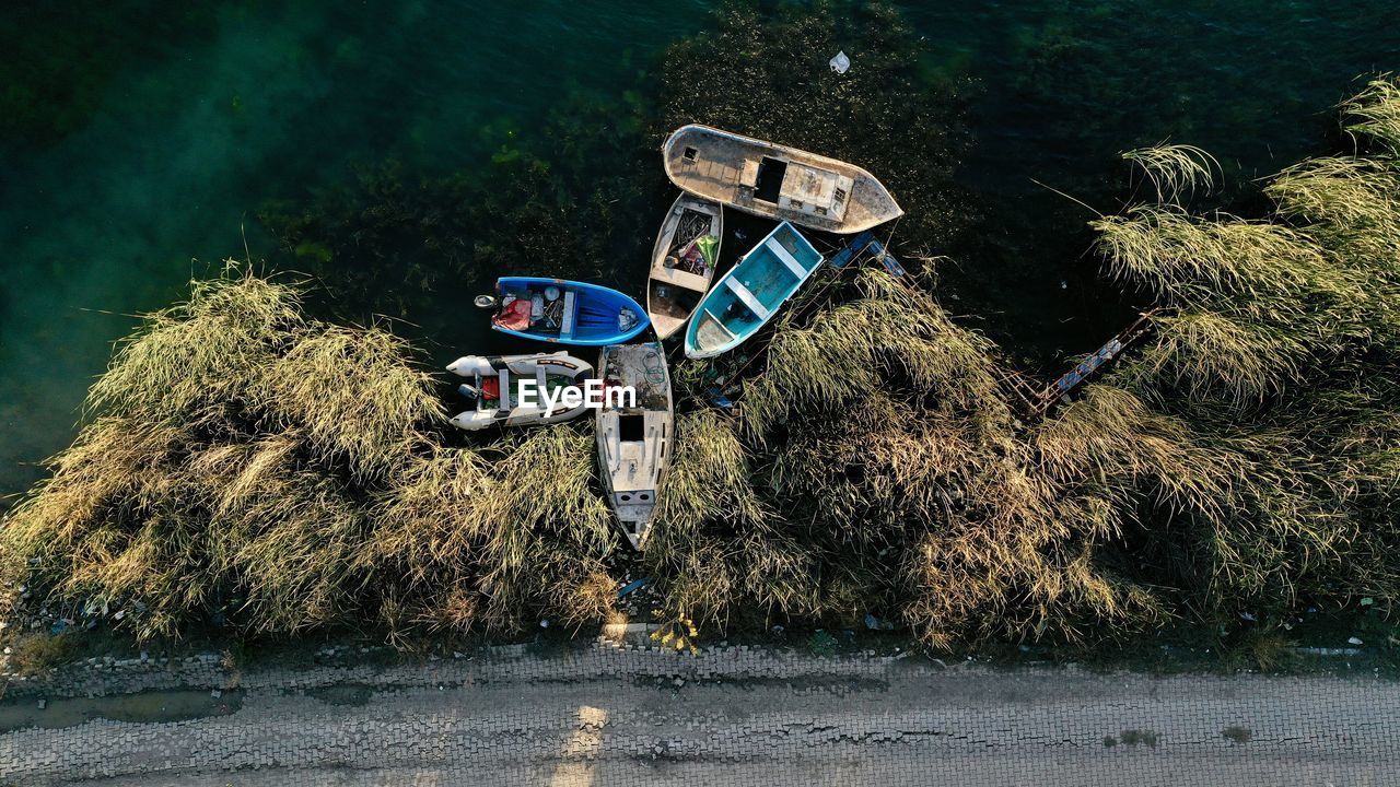 High angle view of abandoned boats on river