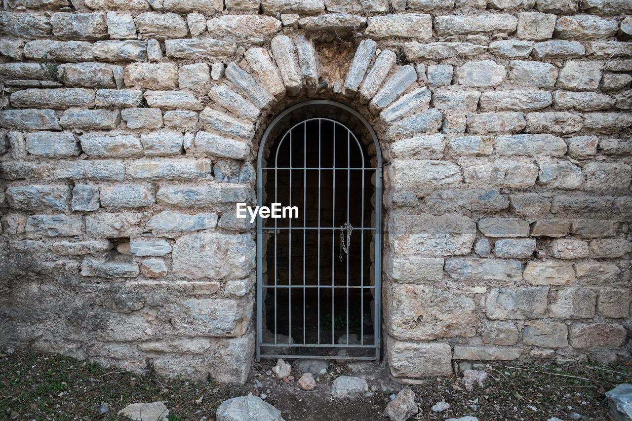 WINDOW ON OLD WALL
