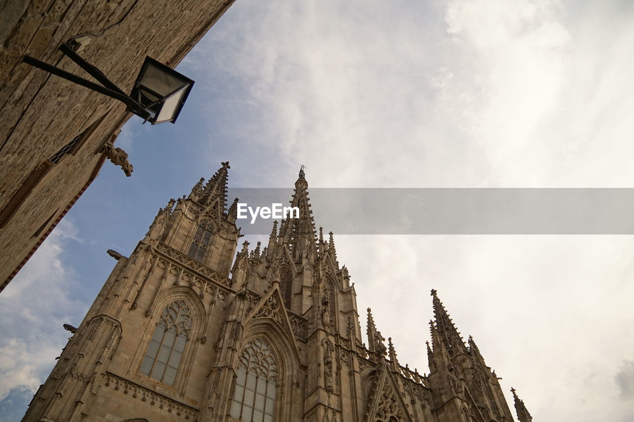 LOW ANGLE VIEW OF A BELL TOWER