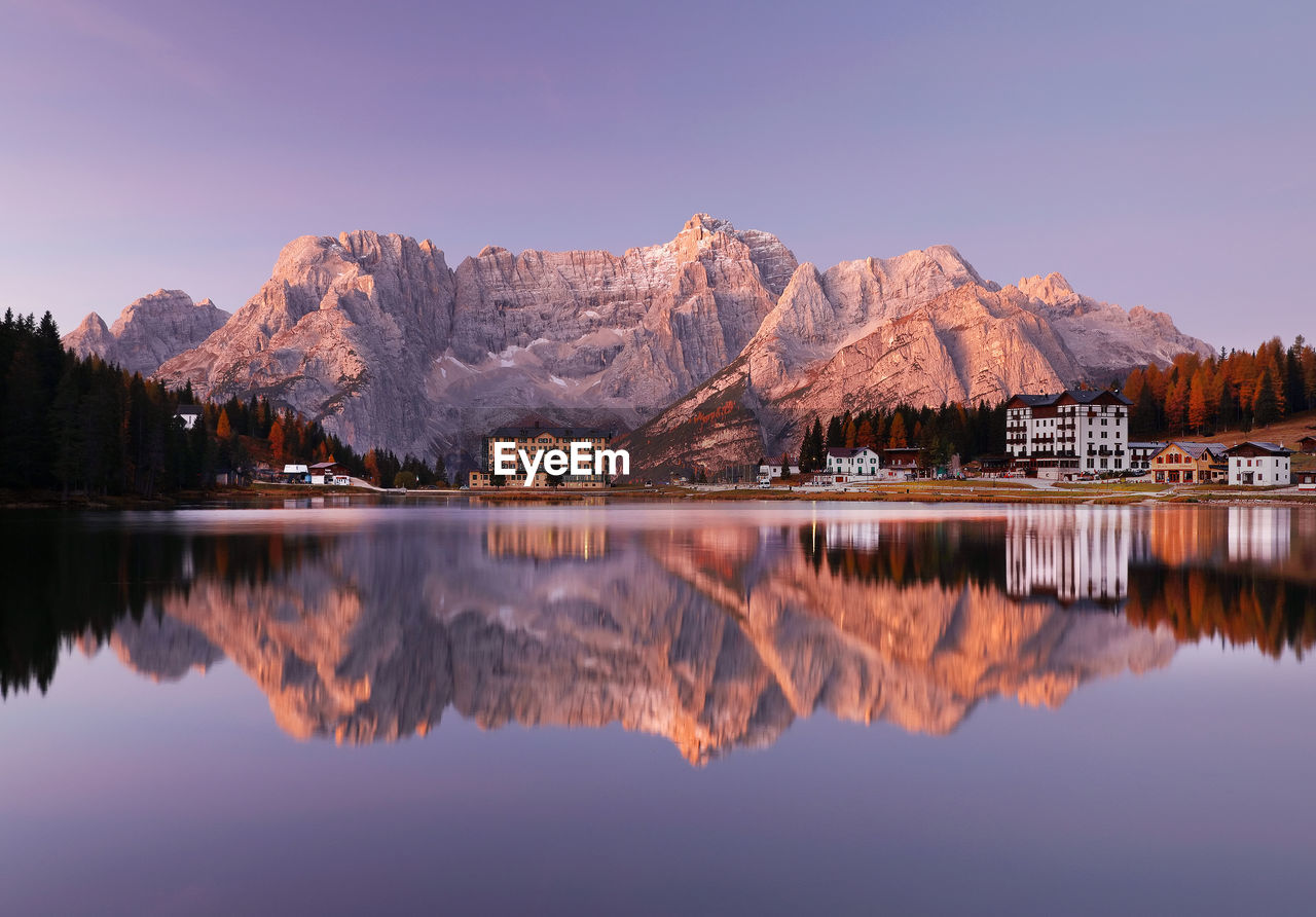 Reflection of mountains in lake against sky