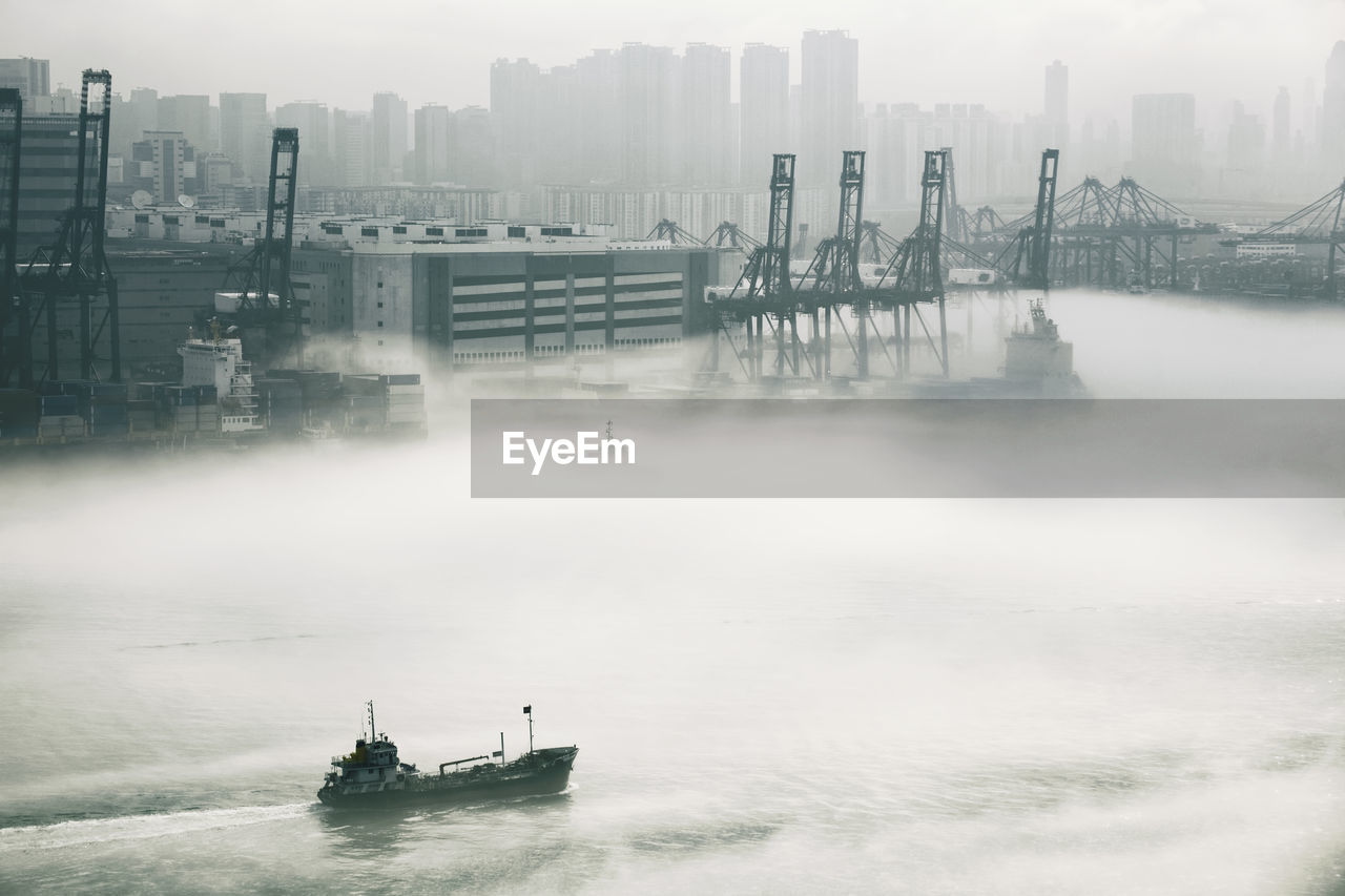 View of hong kong harbor during foggy weather