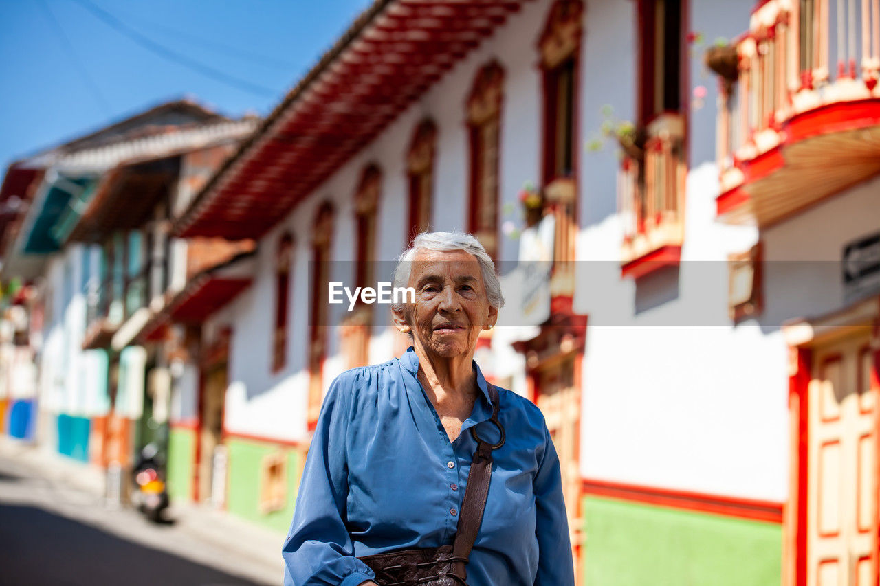 Senior woman tourist at the heritage town of salamina in the department of caldas in colombia