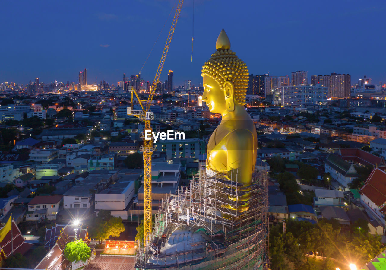 STATUE OF ILLUMINATED BUILDINGS IN CITY