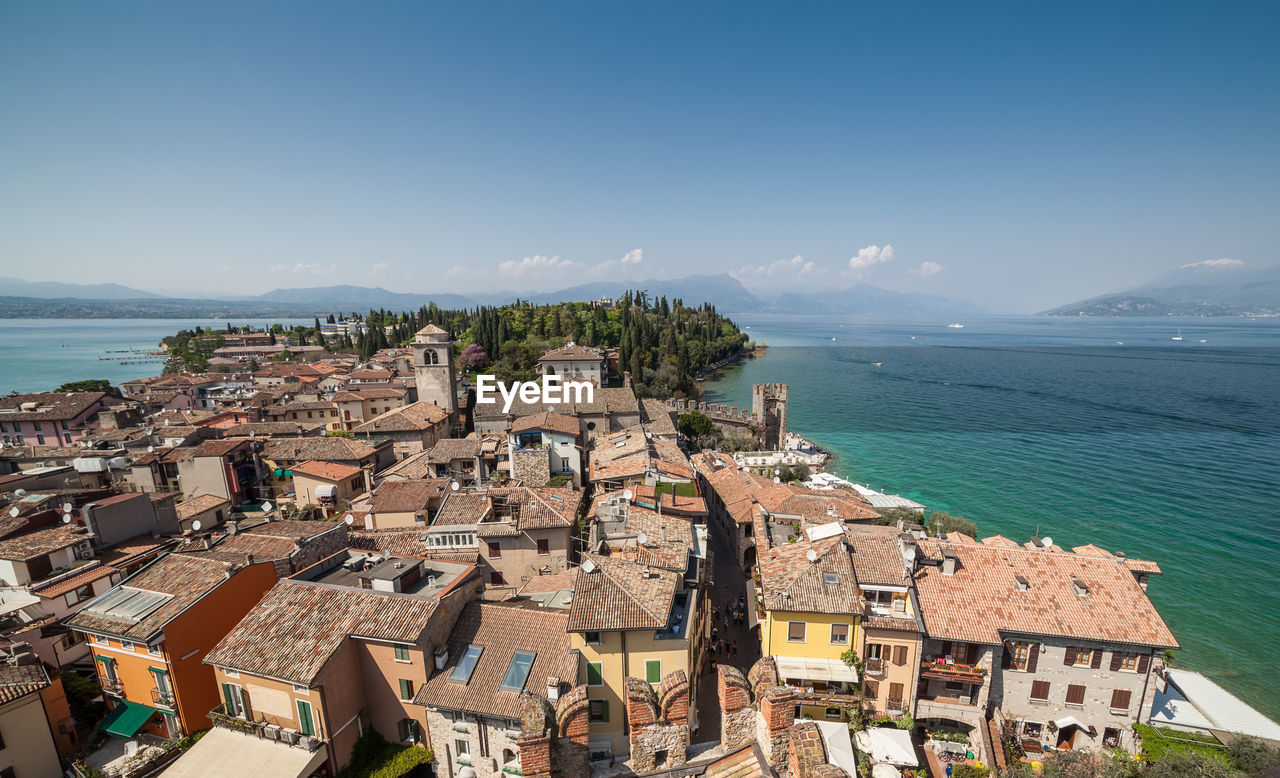 High angle view of buildings amidst sea