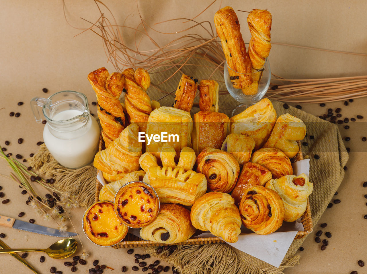 food and drink, food, produce, baked, snack, freshness, dish, no people, table, indoors, healthy eating, container, meal, still life, sweet food, high angle view, large group of objects, breakfast, dessert, fruit, french food, bread, drink, wellbeing, cookie