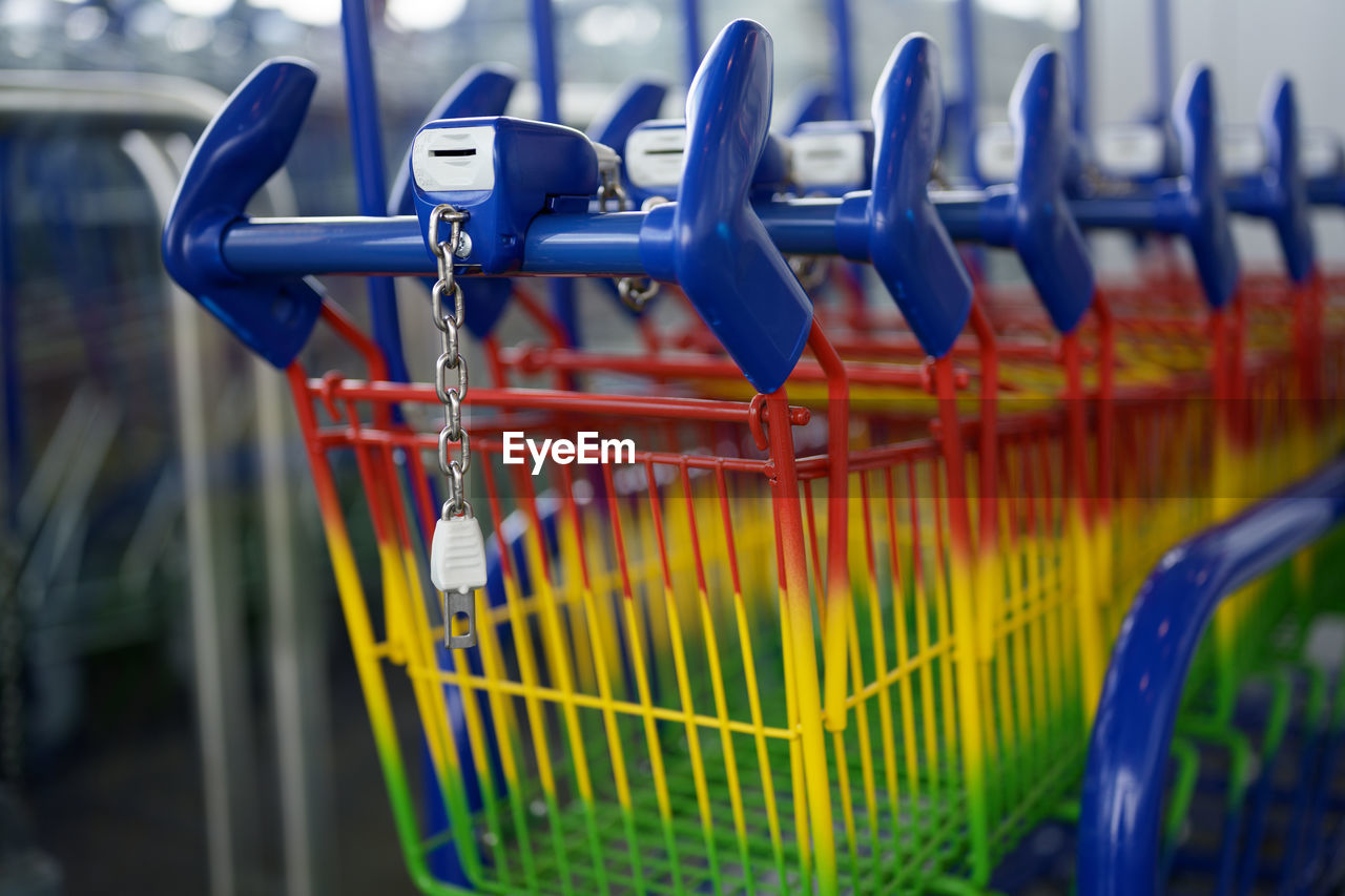 Close-up of colorful shopping cart