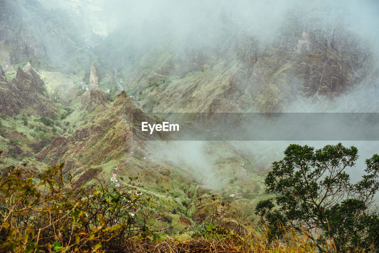 Scenic view of valley and mountains